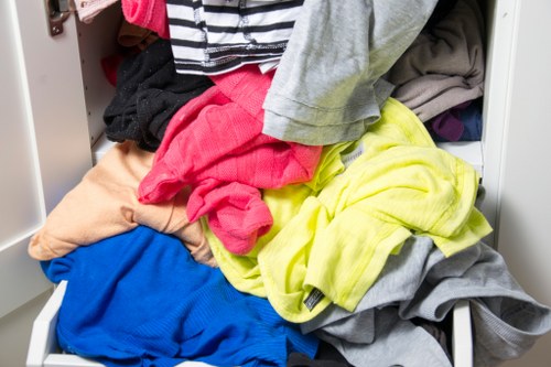 Stacked rubbish ready for removal from a Pimlico garden flat